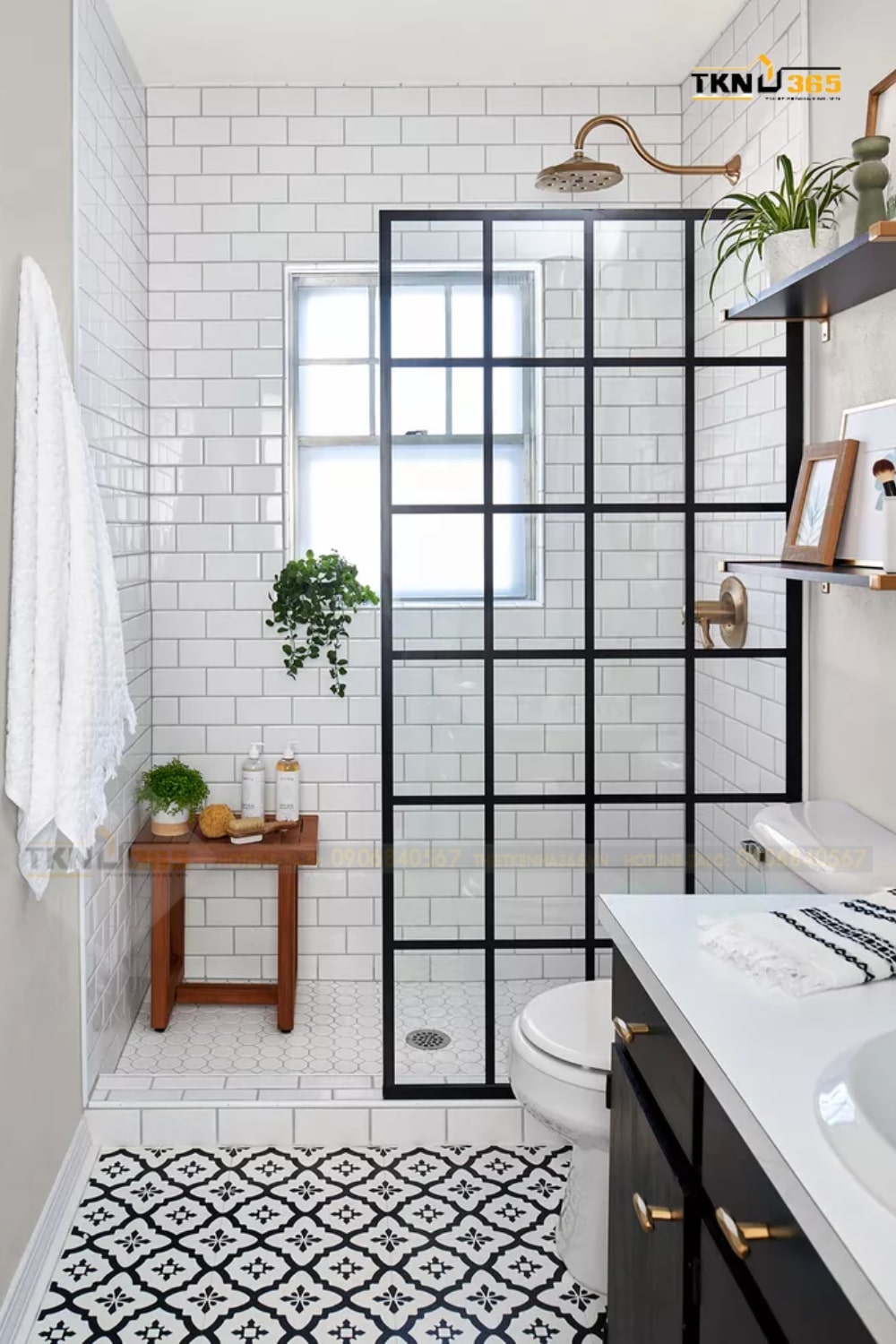 Phòng tắm này được thiết kế với các tông màu tối giản như đen, trắng và nâu gỗ