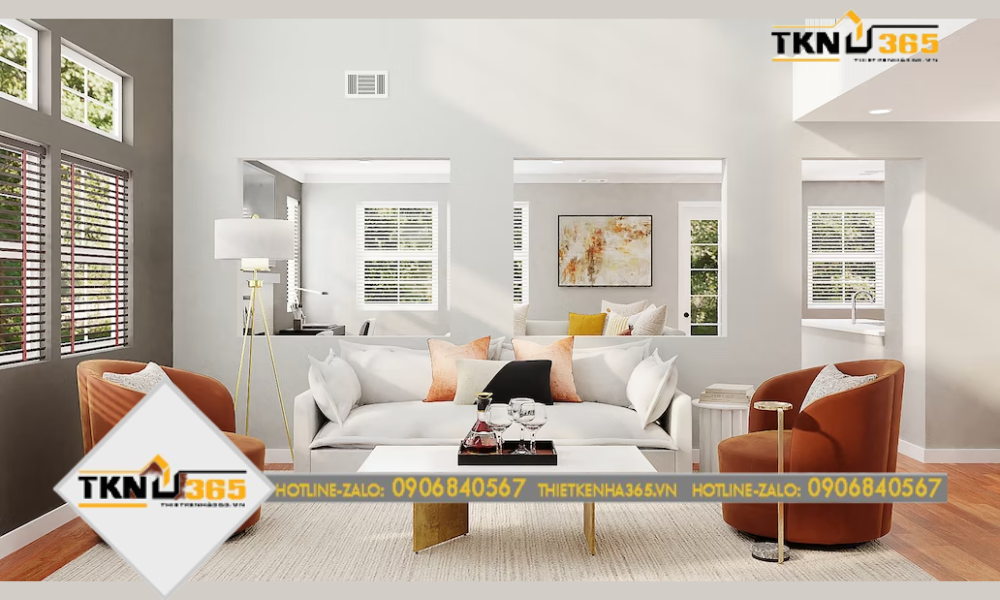 Không gian phòng khách trang trí với bộ sofa và ghế đơn giản nhưng tinh tế, tạo nên một không gian ấm cúng và hiện đại