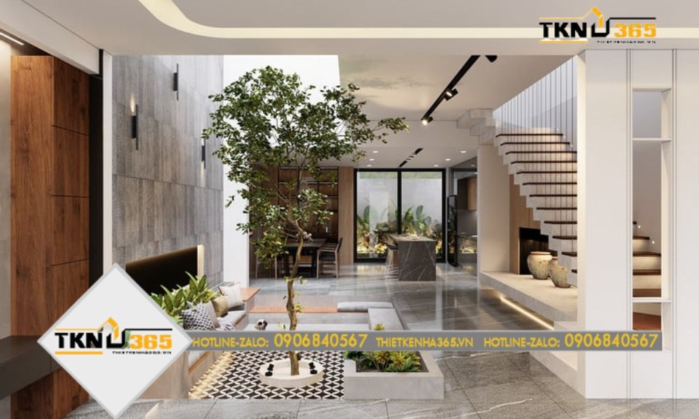 Phòng khách nối với khu vực bếp thông qua tiểu cảnh và cầu thang