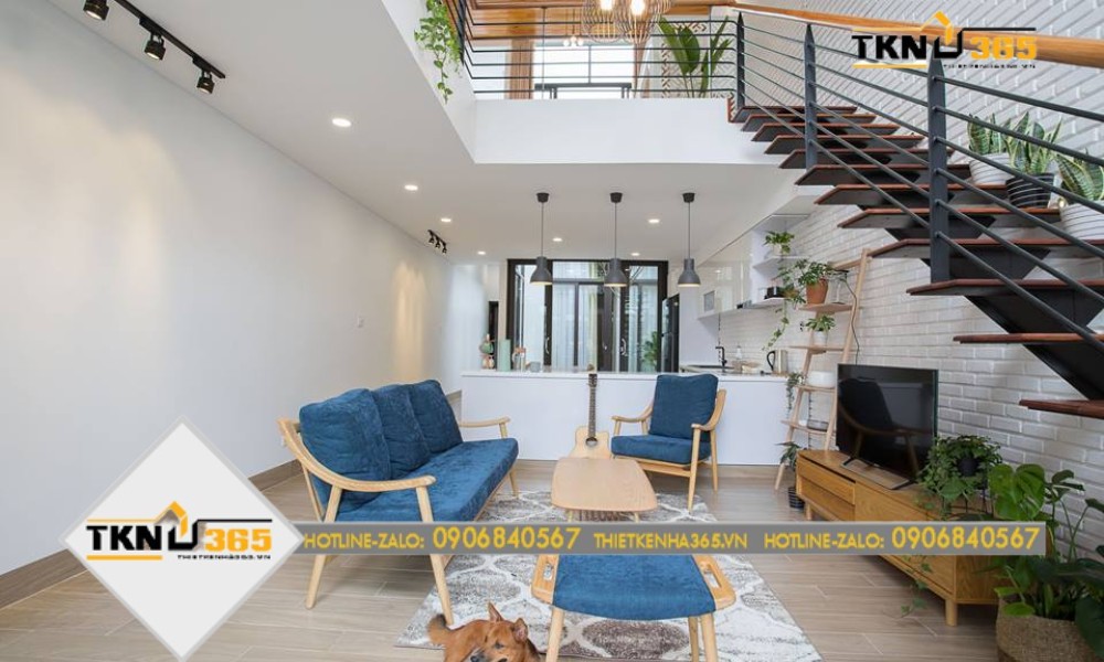 Phòng khách được đặt ở trung tâm và chiếm ⅓ diện tích của tầng 1