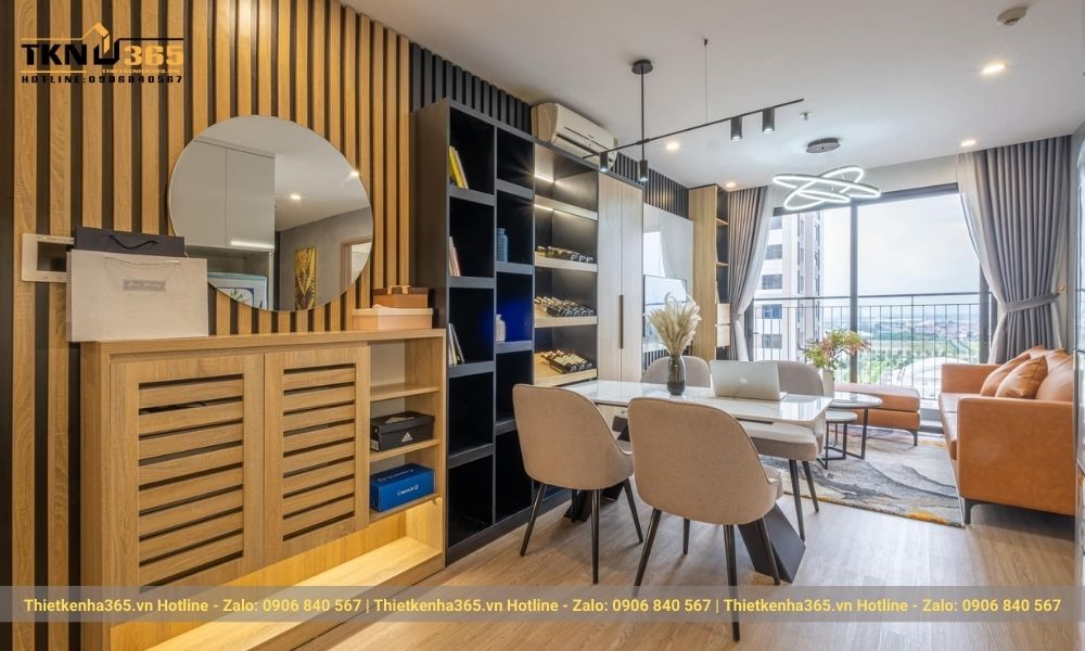 Không gian phòng khách gần phòng bếp giúp căn nhà rỗng rãi hơn