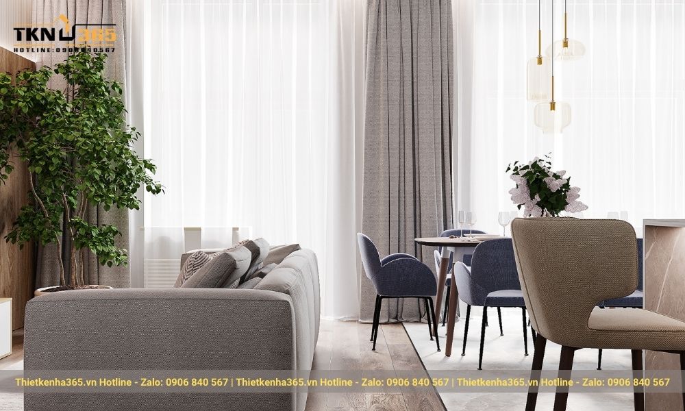 Bộ sofa kế bên bàn ăn tạo cảm giác ấm cúng gia đình nhỏ