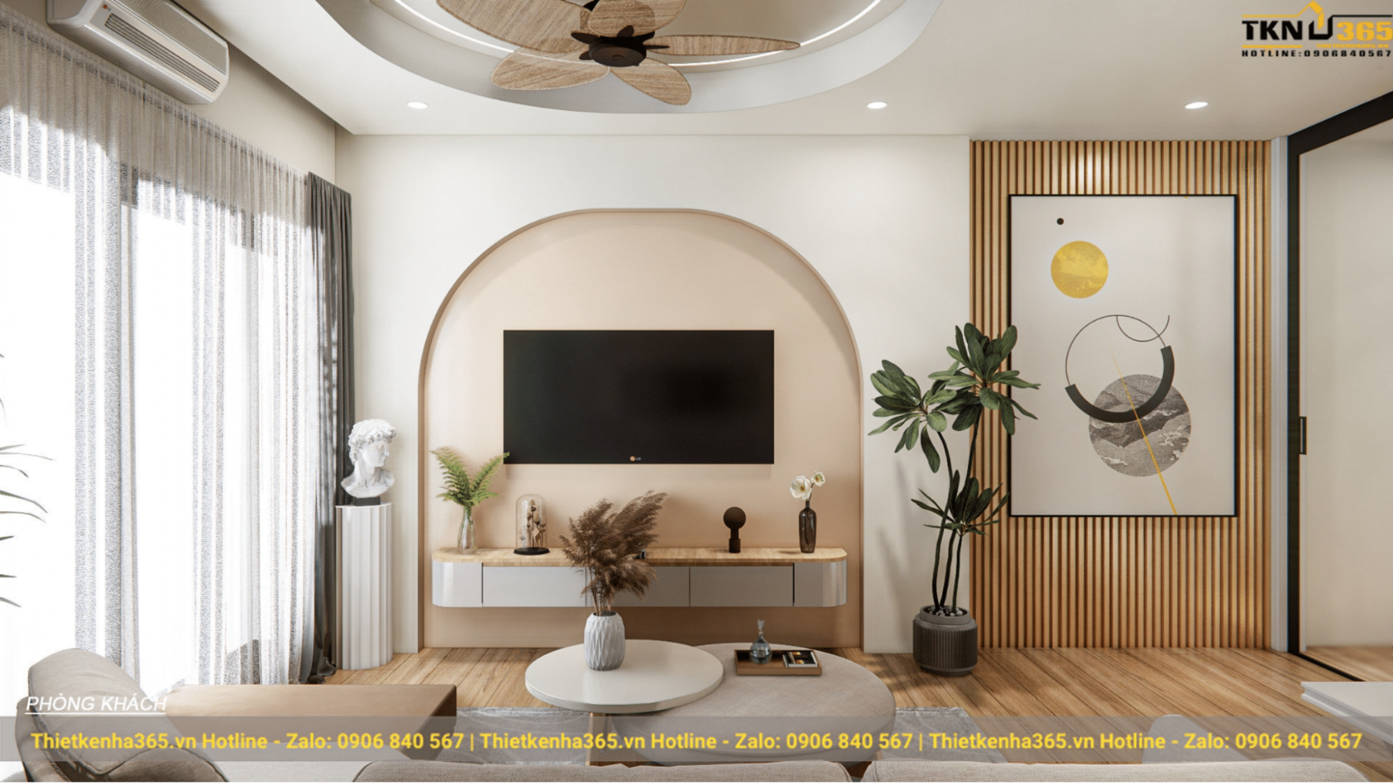 Đối diện là tivi với mảng sơn tường nhấn bo cong ấn tượng
