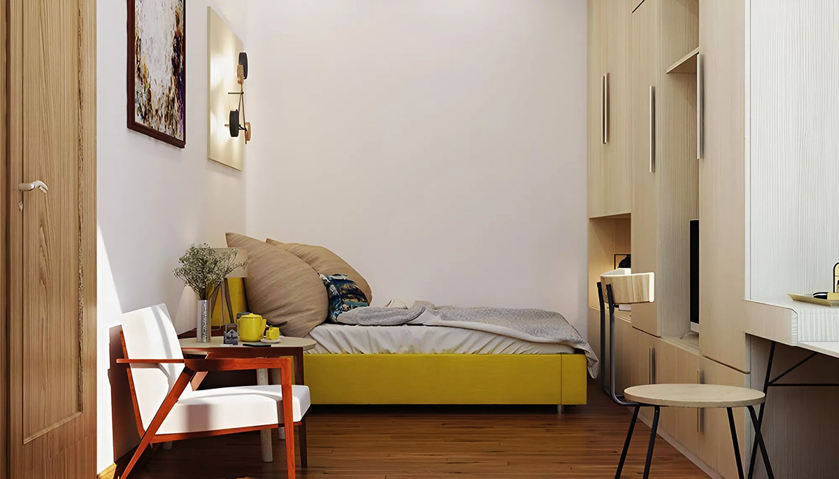 Kệ tủ được kê sát vách giường tạo sự tiện lợi trong chung cư 18m2 Kệ tủ được kê sát vách giường tạo sự tiện lợi trong chung cư 18m2