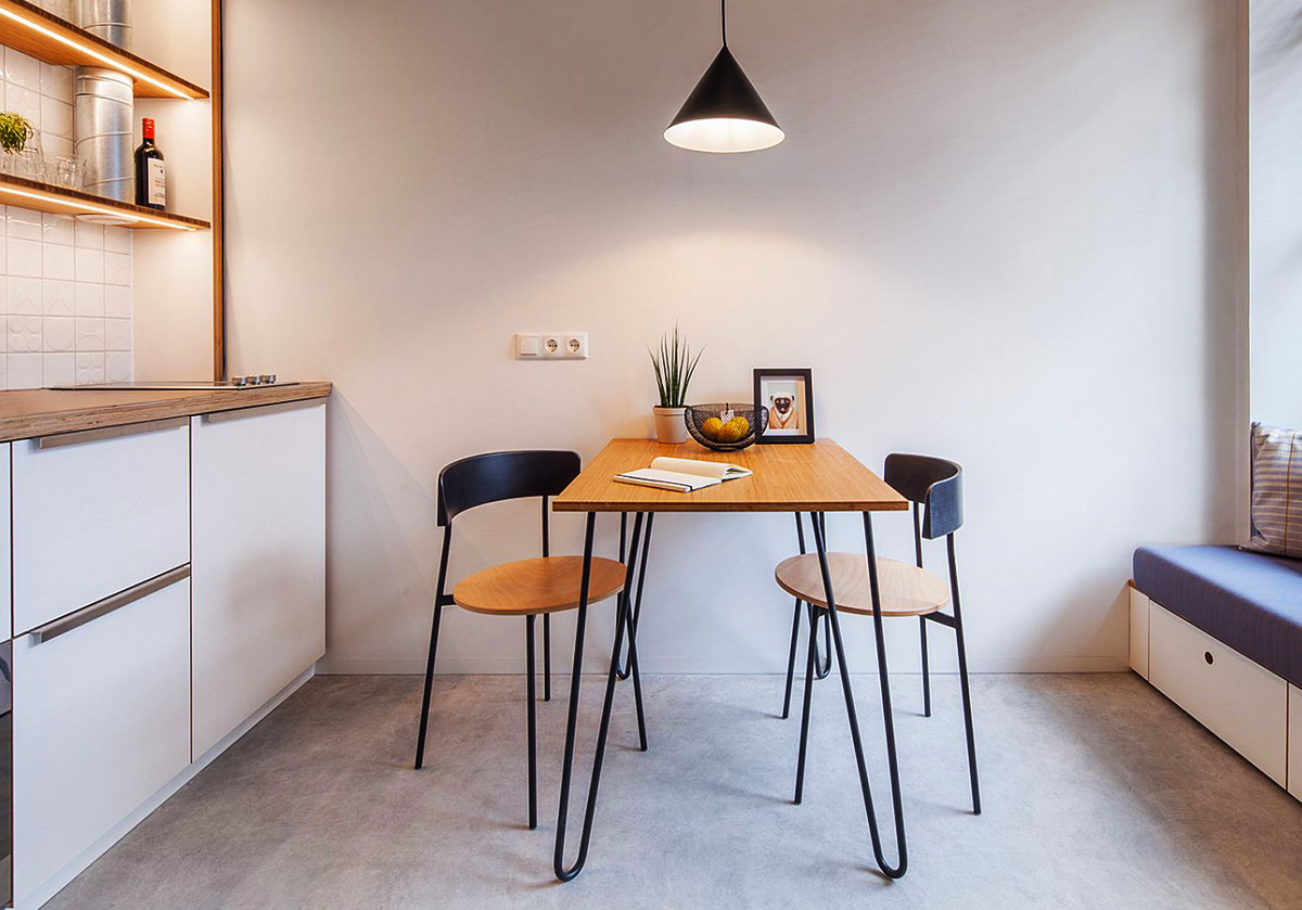 Bàn ăn nhỏ gọn giúp tiết kiệm không gian trong mẫu thiết kế nhà nhỏ 3x6 có gác lửng Bàn ăn nhỏ gọn giúp tiết kiệm không gian trong mẫu thiết kế nhà nhỏ 3x6 có gác lửng