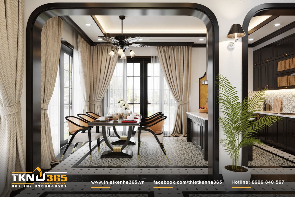 Bàn ăn gỗ sang trọng, đèn chùm tinh xảo là điểm nhấn nổi bật của không gian