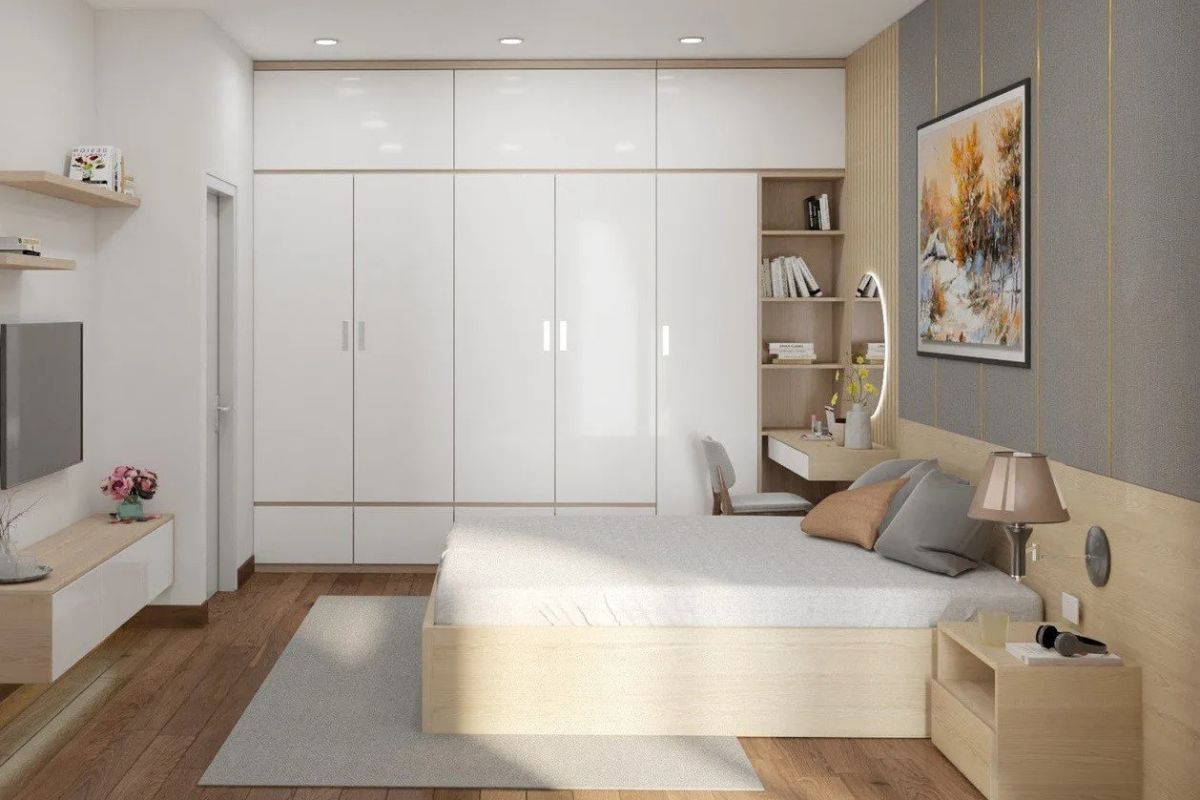 Mẫu tủ quần áo kịch trần hiện đại với thiết kế phẳng, gam màu trắng sáng mang lại sự gọn gàng và tinh tế cho phòng ngủ
