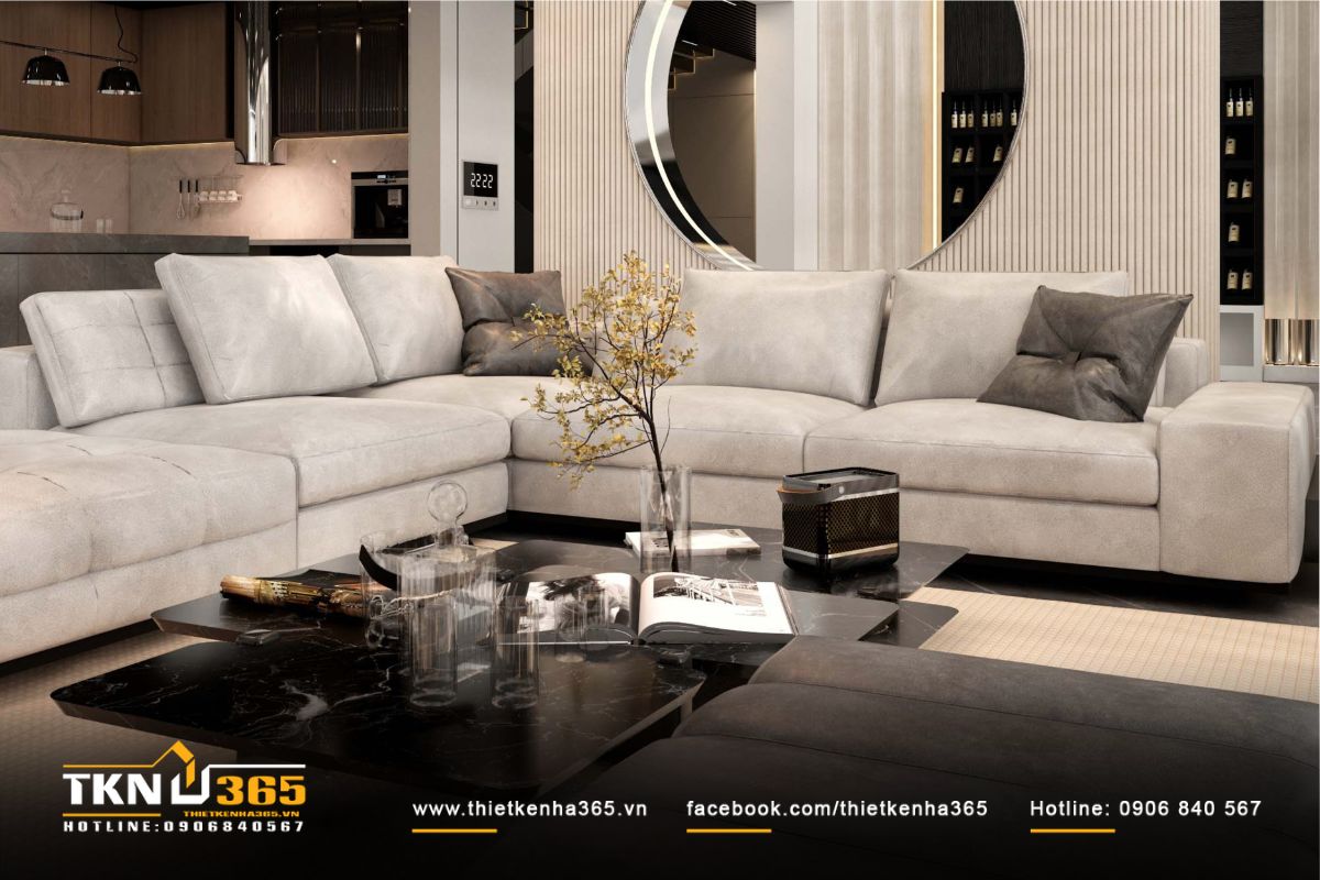 Sofa nỉ màu be và bàn trà đá đen tạo trung tâm tiếp khách sang trọng, ấm cúng