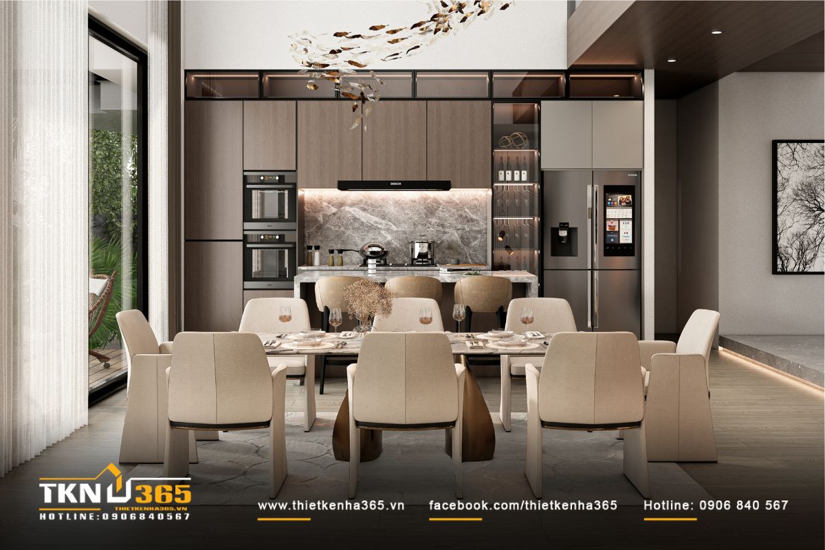 Không gian bếp - ăn hiện đại nhờ hệ tủ bếp cao kịch trần, vật liệu đá tự nhiên và gam màu trung tính sang trọng