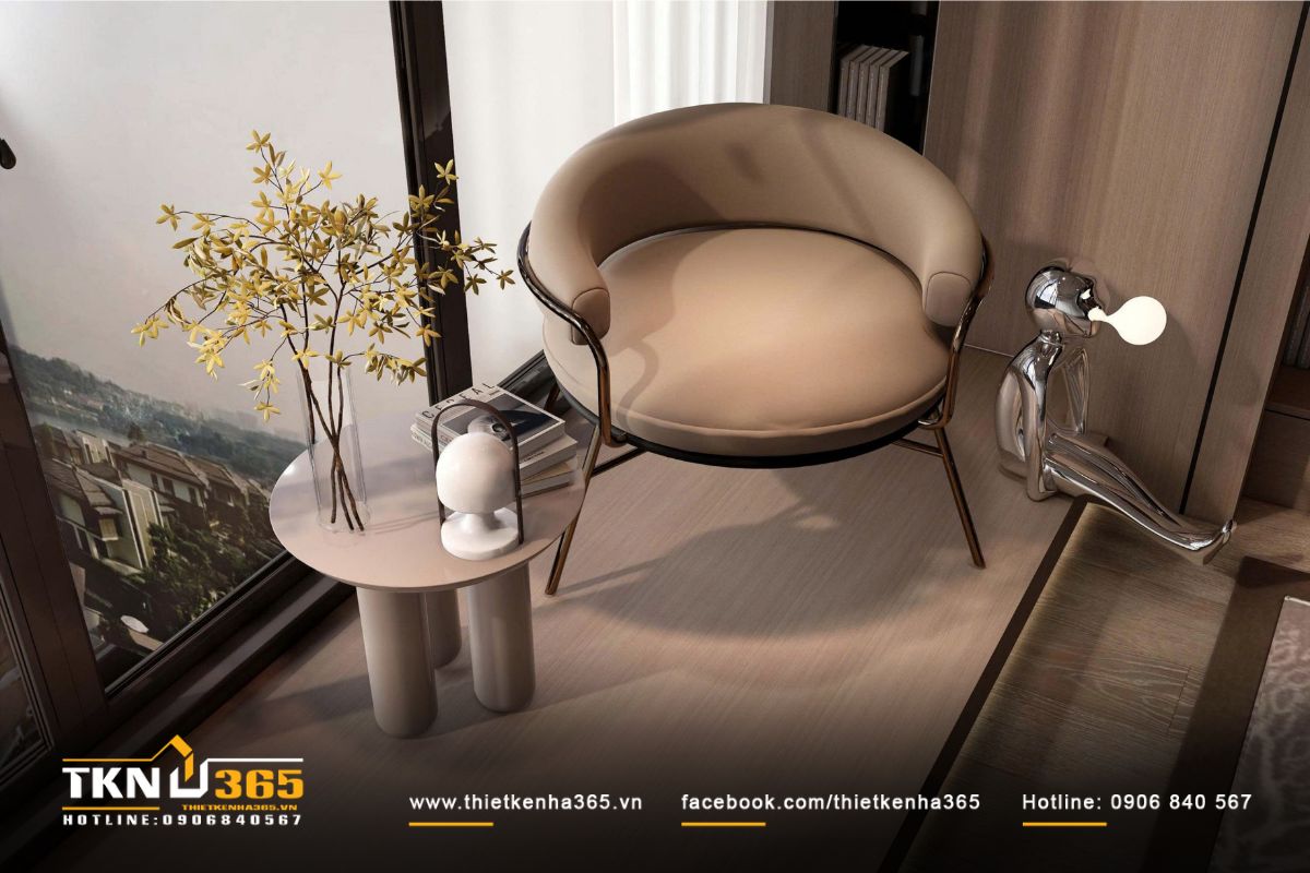 Góc thư giãn bên cửa sổ với ghế bọc da và bàn tròn nhỏ, mở tầm nhìn thoáng đãng ra cảnh quan bên ngoài