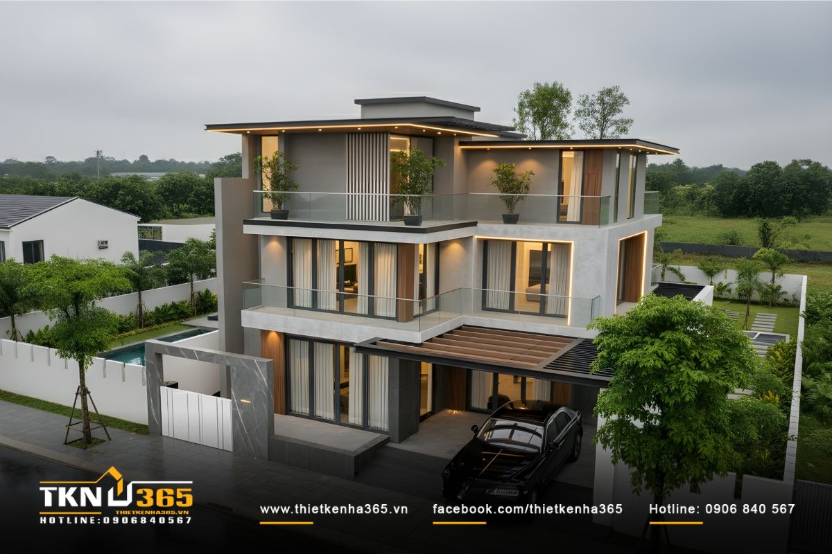 Từ góc nhìn trên cao, biệt thự 3 tầng xuất hiện như tổ hợp nghỉ dưỡng riêng tư giữa thiên nhiên, hướng tầm nhìn ra hồ bơi và khu vườn