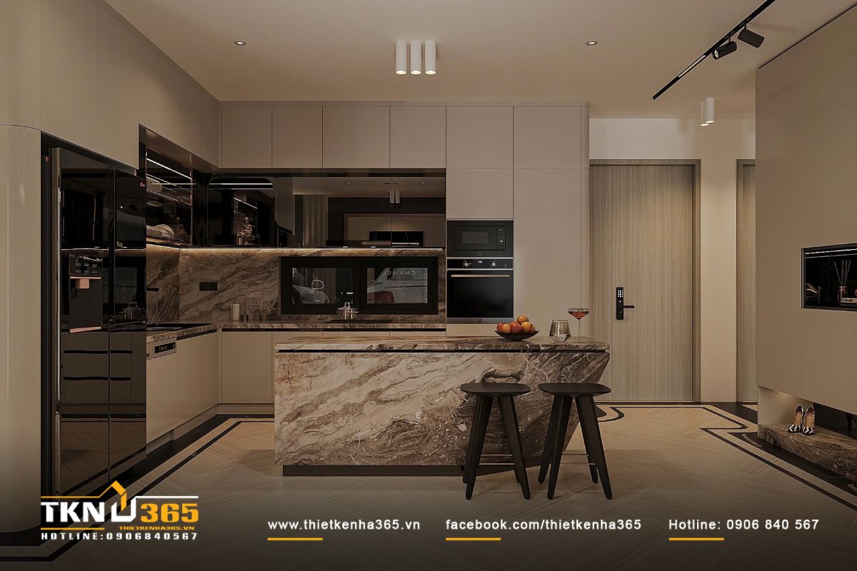 Khu bếp sử dụng hệ tủ phẳng kết hợp đảo trung tâm ốp đá vân tự nhiên, tăng không gian lưu trữ và thể hiện gu thẩm mỹ cá tính