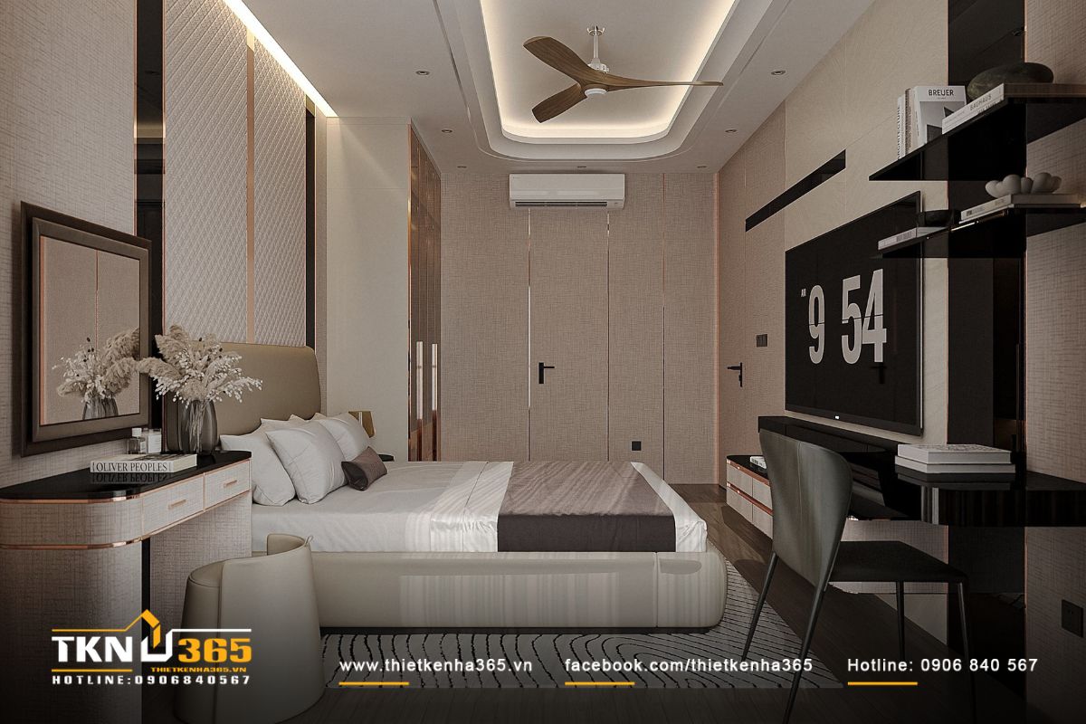 Chiếc giường bọc da sáng màu đặt ở trung tâm phòng ngủ