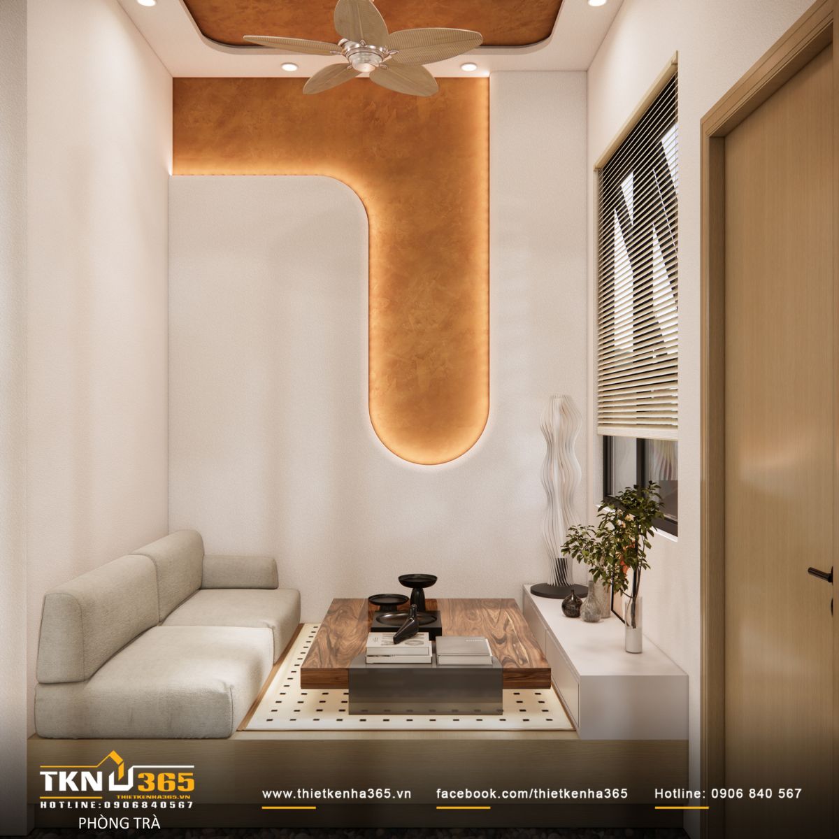 Bàn trà thấp, ghế bọc nệm sáng màu và mảng tường bo cong tạo thành nơi lý tưởng để đọc sách, thưởng trà hoặc trò chuyện cùng người thân