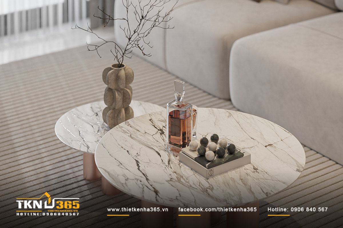 Bàn trà đôi bằng đá vân mây là điểm nhấn tinh tế của phòng khách