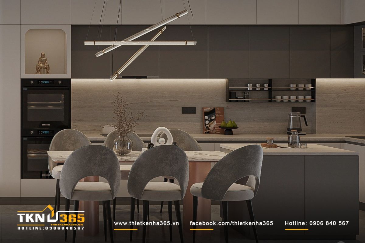 Không gian bếp - ăn liền kề, bố trí bàn đảo và bàn ăn song song, giúp thao tác nấu nướng thuận tiện