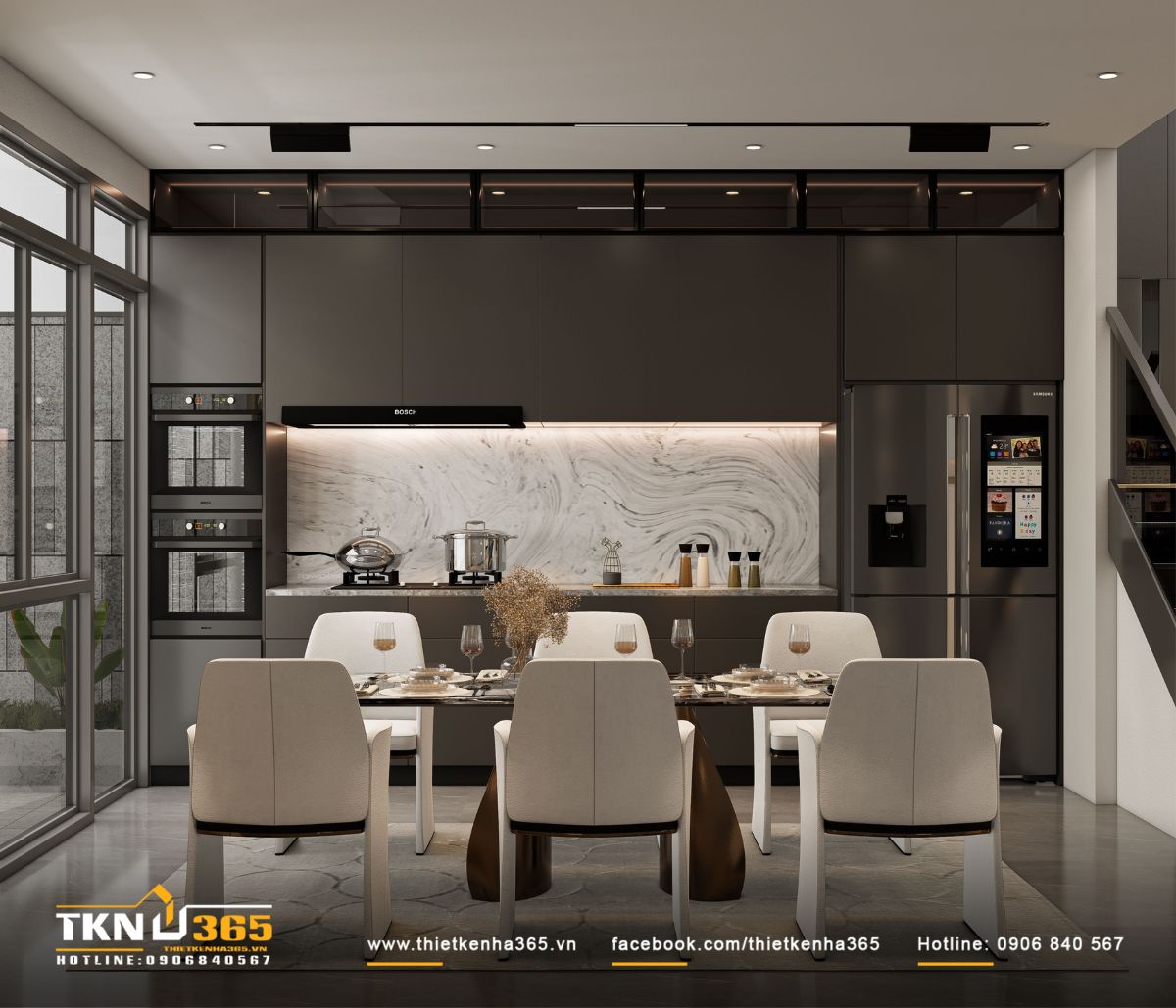 Không gian bếp - ăn liền mạch, đón sáng tự nhiên qua hệ cửa kính lớn, mang lại cảm giác thoáng đãng