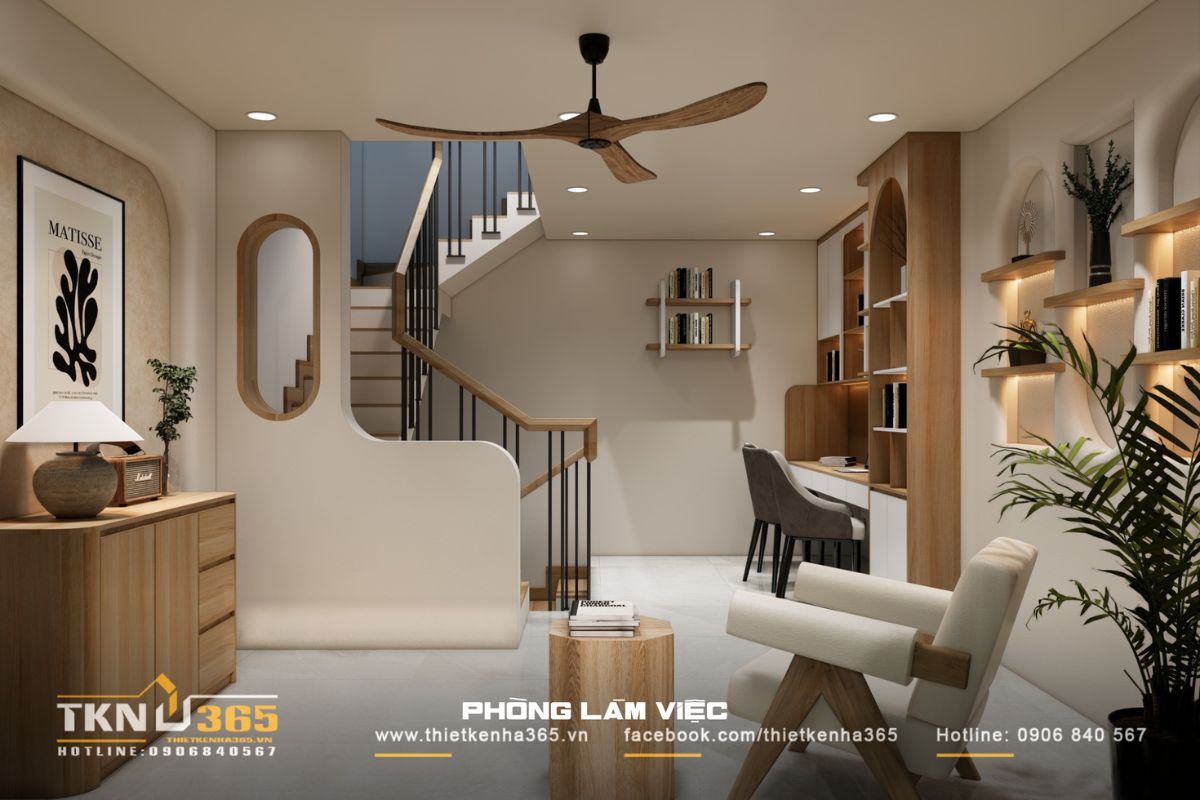 Khu vực làm việc bố trí dọc tường, kết hợp kệ trang trí âm tường gọn gàng cùng ánh sáng vàng dịu nhẹ