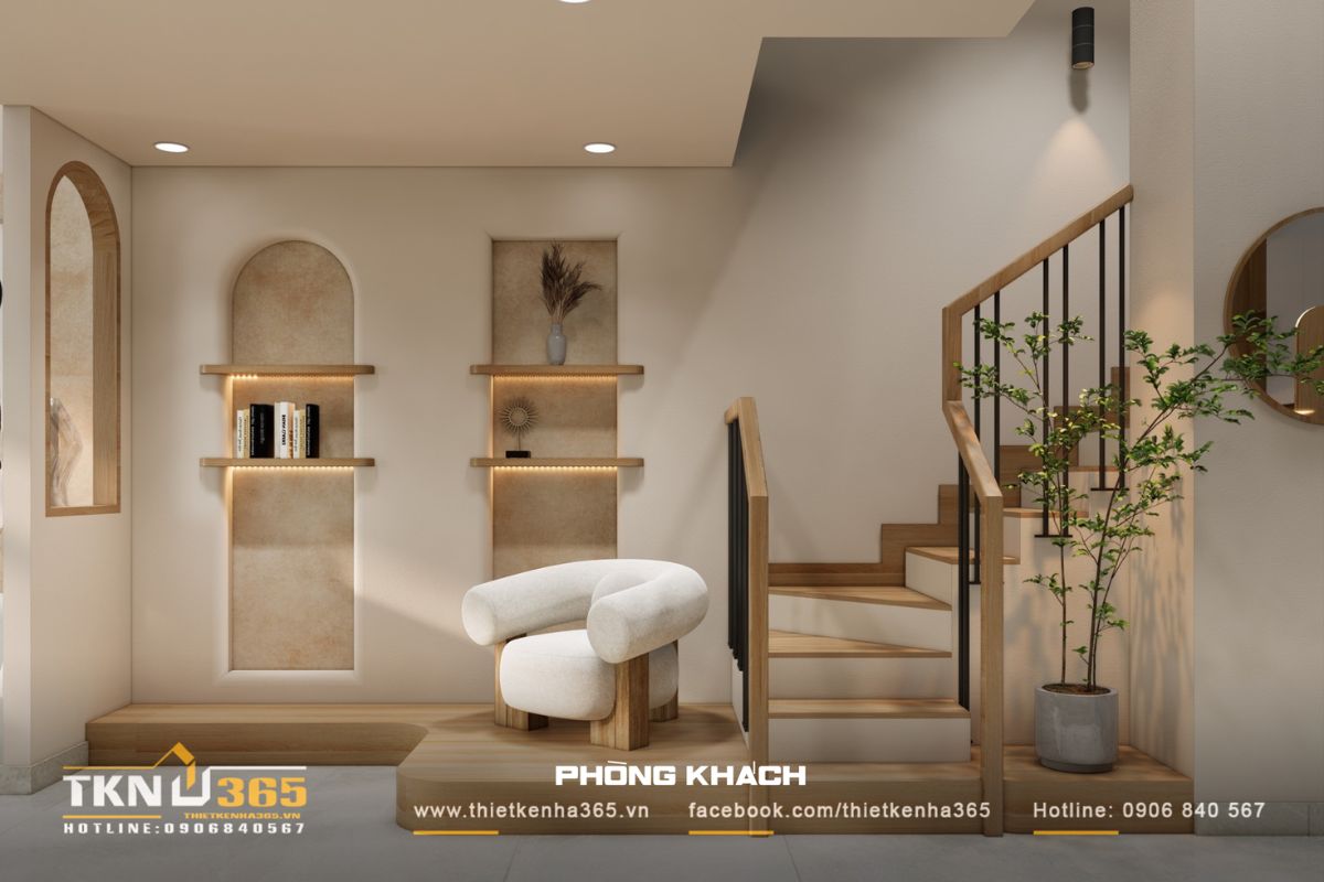 Khu vực cầu thang với đường cong bo tròn, tạo điểm nhấn mềm mại cho nhà phố