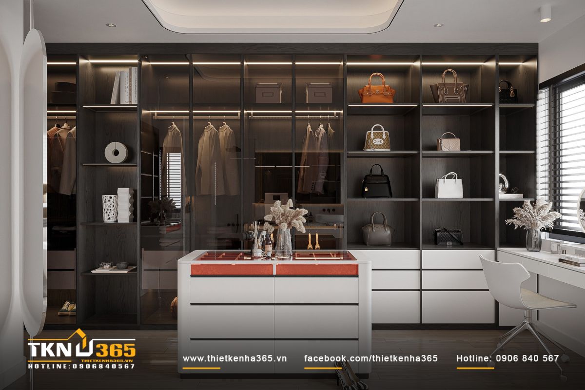 Bàn đảo trung tâm là điểm nhấn của phòng thay đồ, các phụ kiện được trưng bày ngăn nắp, thuận tiện khi sử dụng hàng ngày