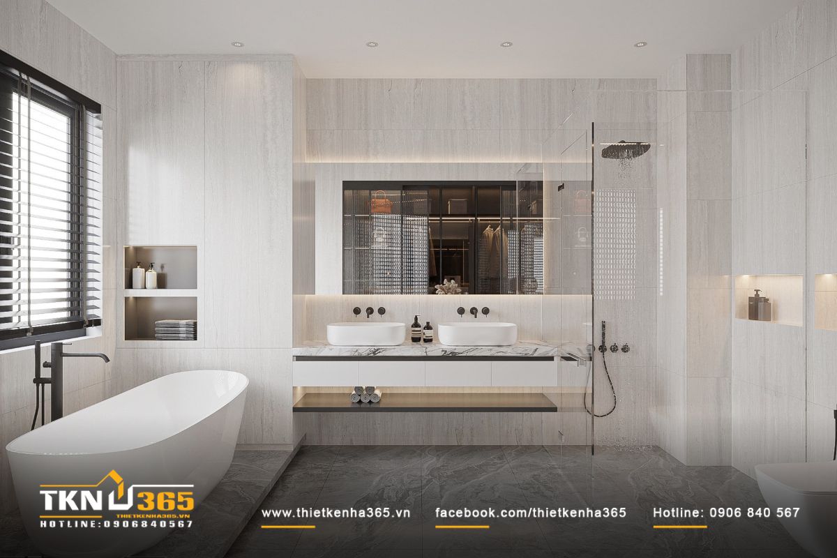 Phòng tắm phủ tông màu sáng, bố trí bồn tắm và lavabo đôi như spa tại gia