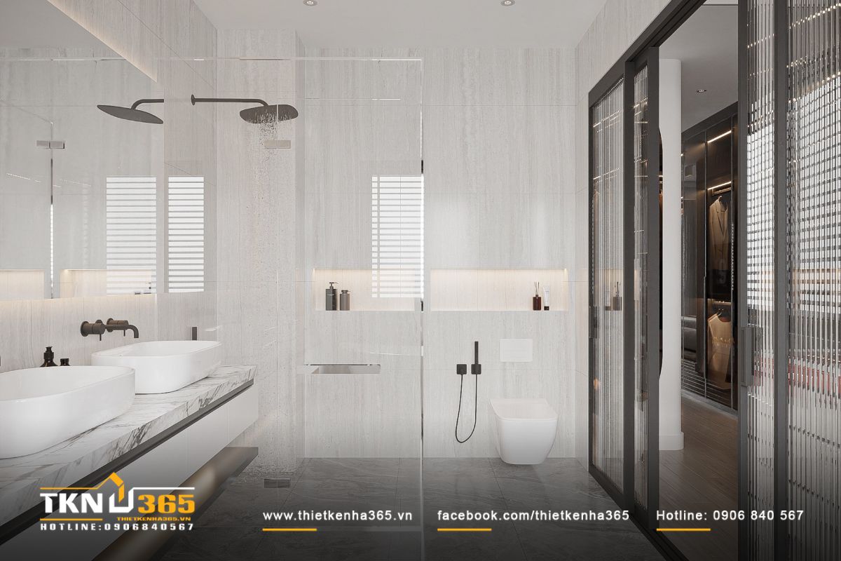 Không gian nhà tắm rộng thoáng nhờ sự kết hợp hài hòa giữa ánh sáng tự nhiên và nhân tạo