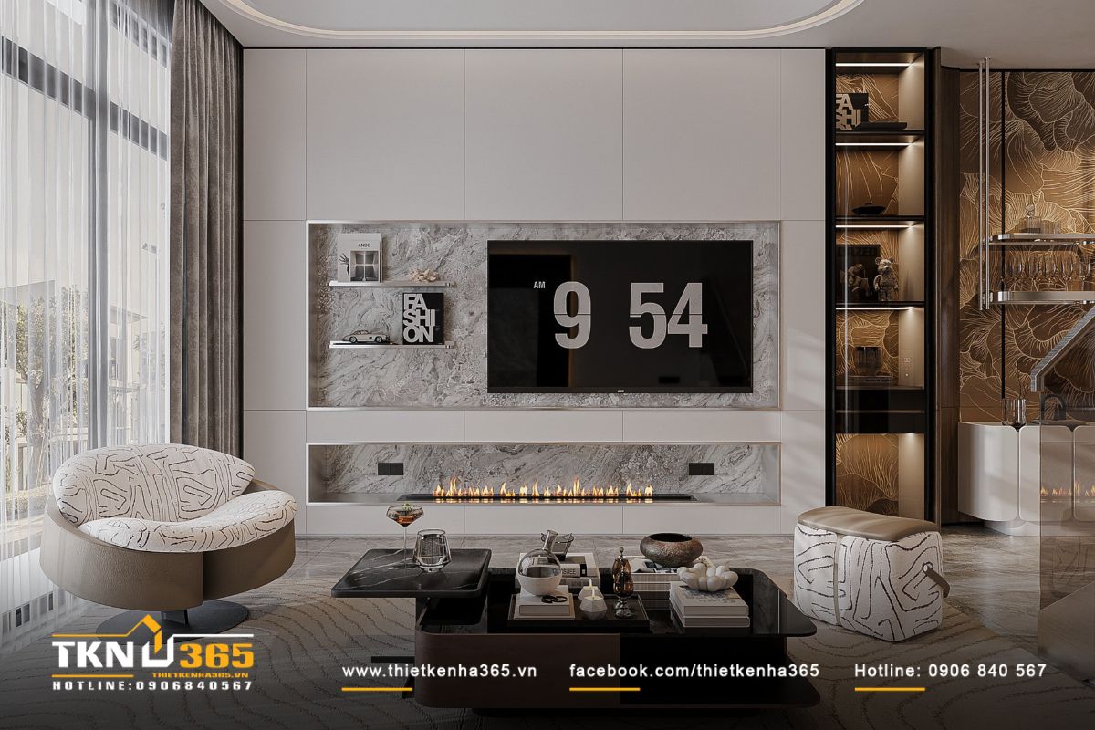 Khu vực đặt tivi tích hợp tủ kệ trang trí trở thành điểm nhấn ấm cúng và hiện đại cho phòng khách