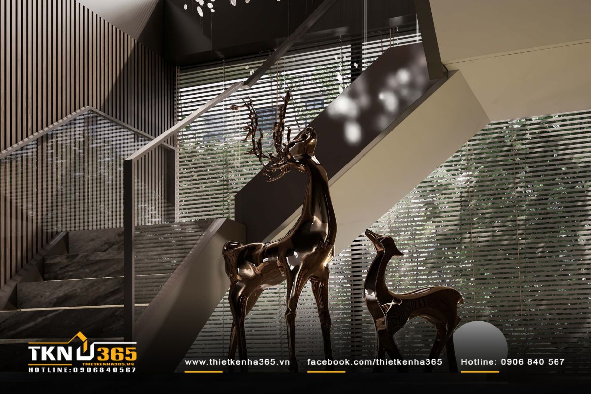 Cầu thang trong D’s Villa thiết kế như một tác phẩm điêu khắc, bậc ốp đá tự nhiên vân đậm kết hợp ánh sáng ấm áp từ đèn LED