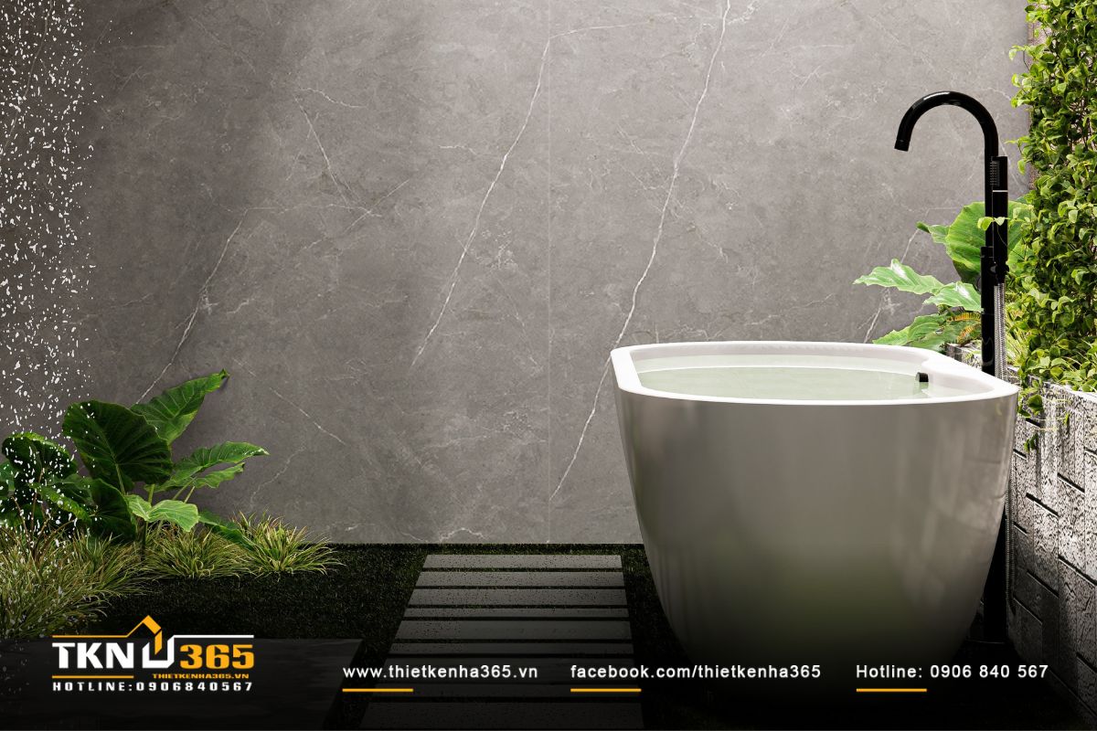 Lớp kính hoa văn mờ giữ sự riêng tư mà vẫn cho ánh sáng xuyên qua, làm mềm ranh giới giữa trong và ngoài