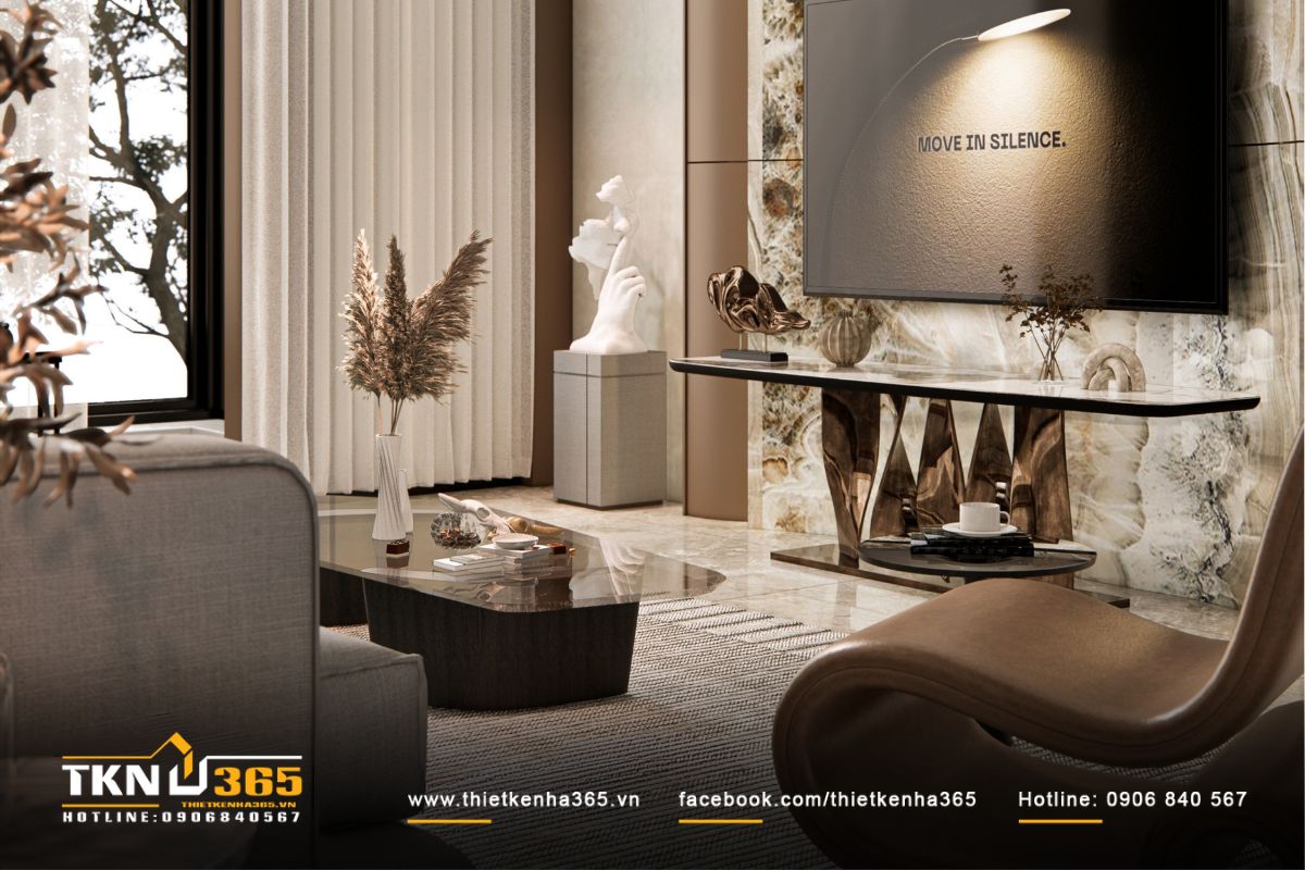 Phòng khách mang tinh thần tối giản với bảng màu be, xám và gỗ trầm ấm áp, thanh lịch