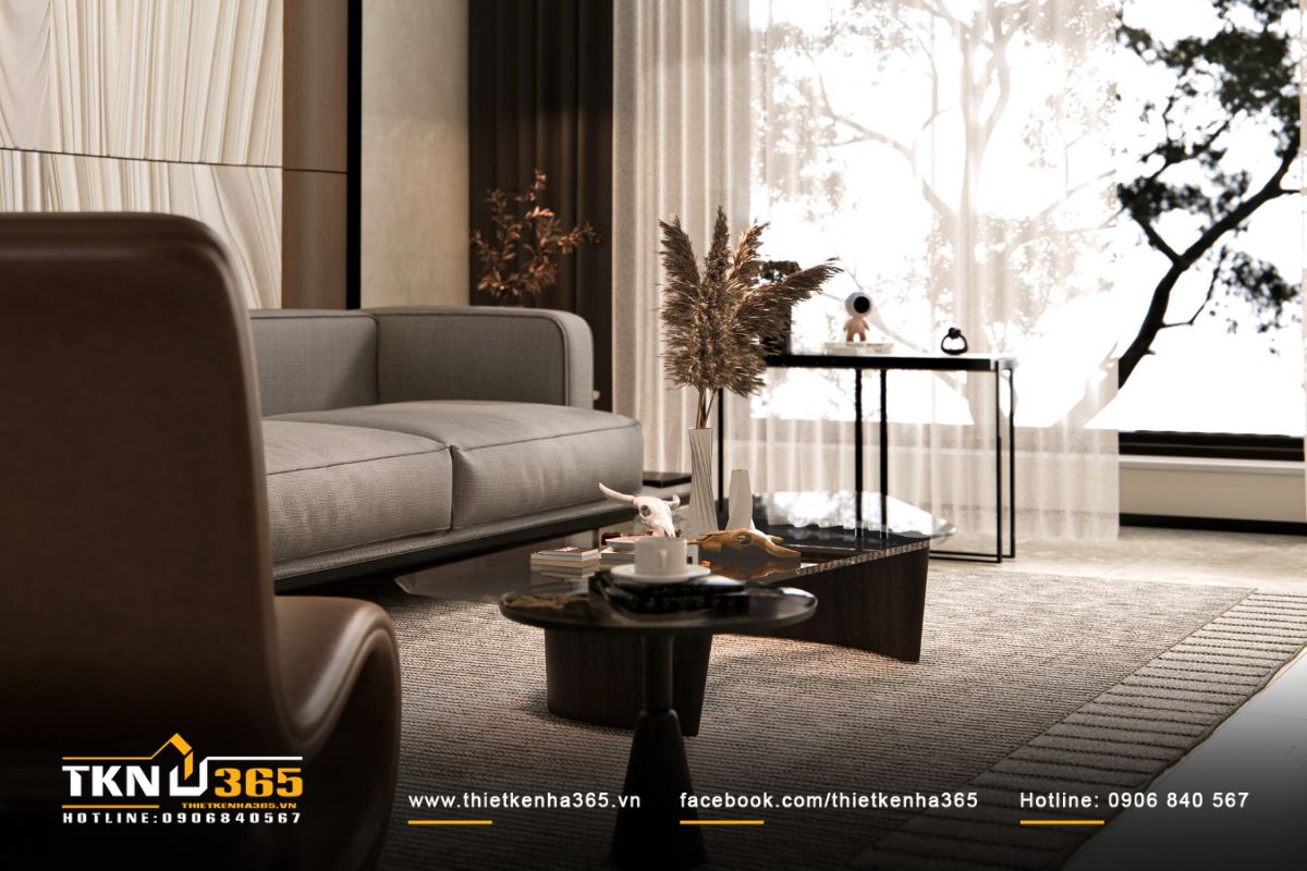 Ánh sáng tự nhiên xuyên qua lớp rèm mỏng, làm mềm không gian và tôn lên sắc độ trung tính của nội thất