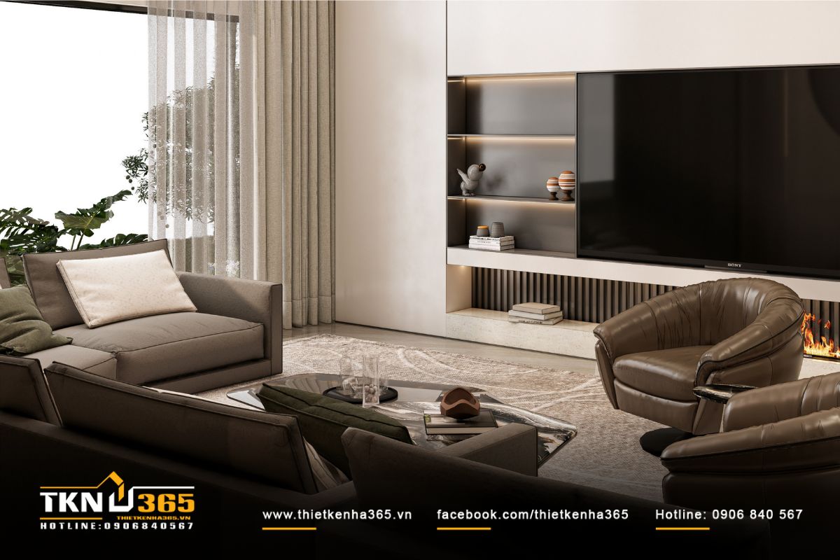 Kệ tivi âm tường, đèn hắt ẩn và chi tiết kim loại ánh đồng tạo chiều sâu thị giác