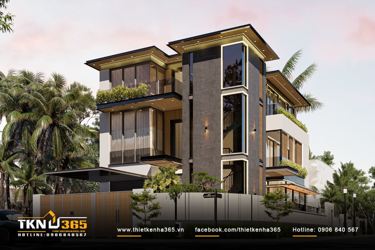 Tổng thể mặt đứng tổ chức cân bằng theo trục dọc và ngang, khối giữa ốp đá tối màu chứa hệ cầu thang lấy sáng tự nhiên xuyên suốt ba tầng