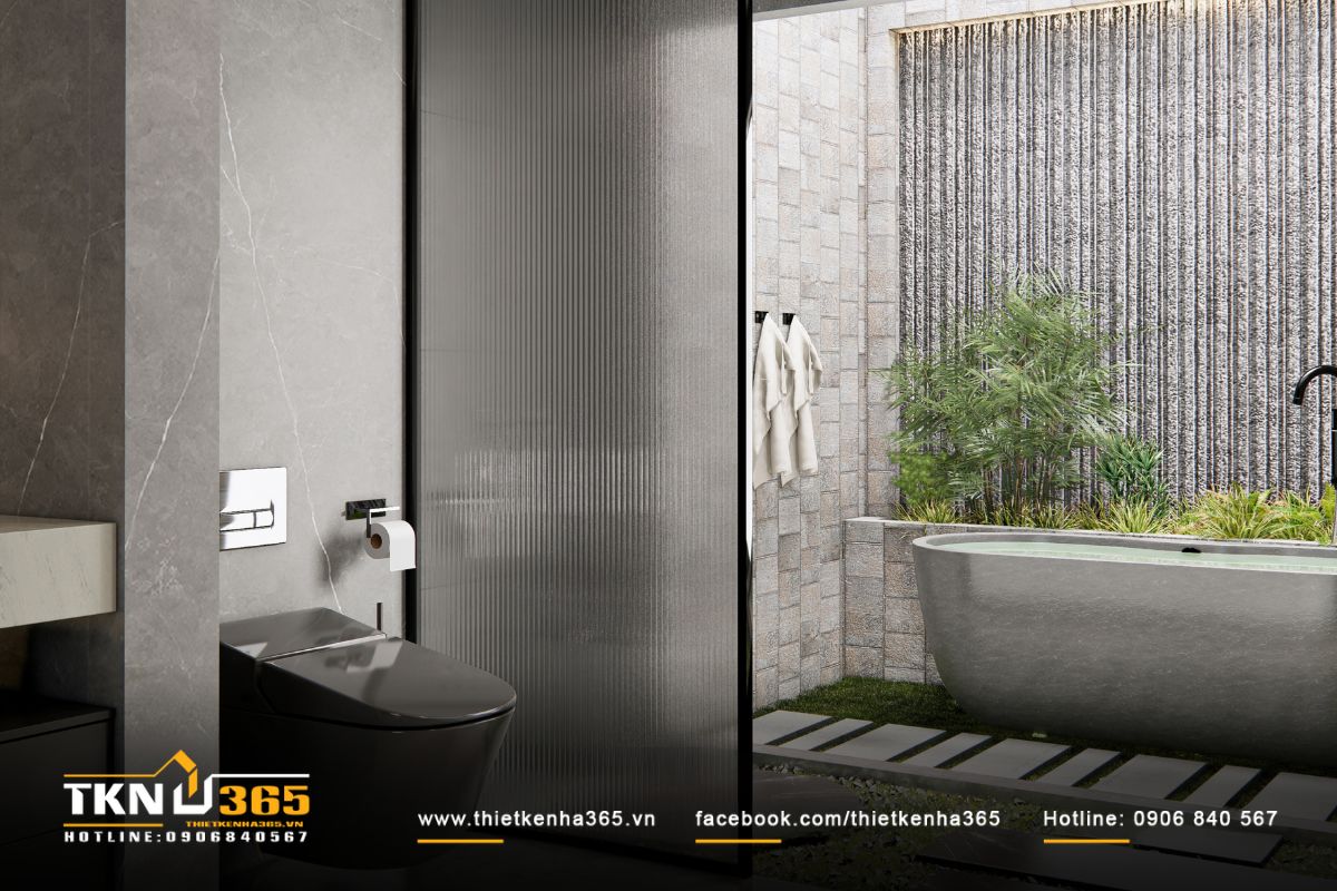 Khu tắm mở ra khu vườn nhỏ, ngăn bằng vách kính sọc mờ đảm bảo riêng tư mà vẫn thoáng sáng