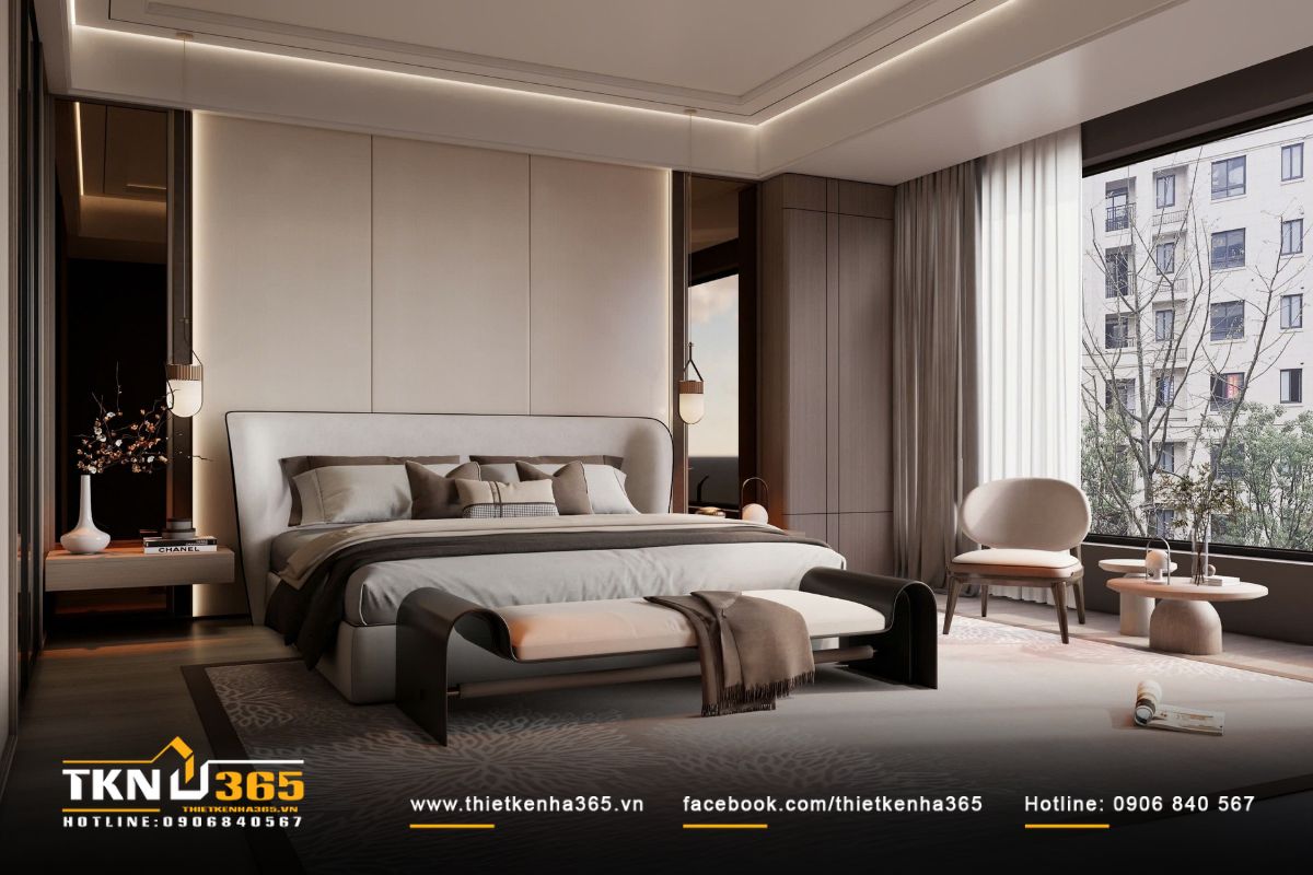 Phòng ngủ master sử dụng bảng màu trung tính và ánh sáng dịu nhẹ bao quanh trần