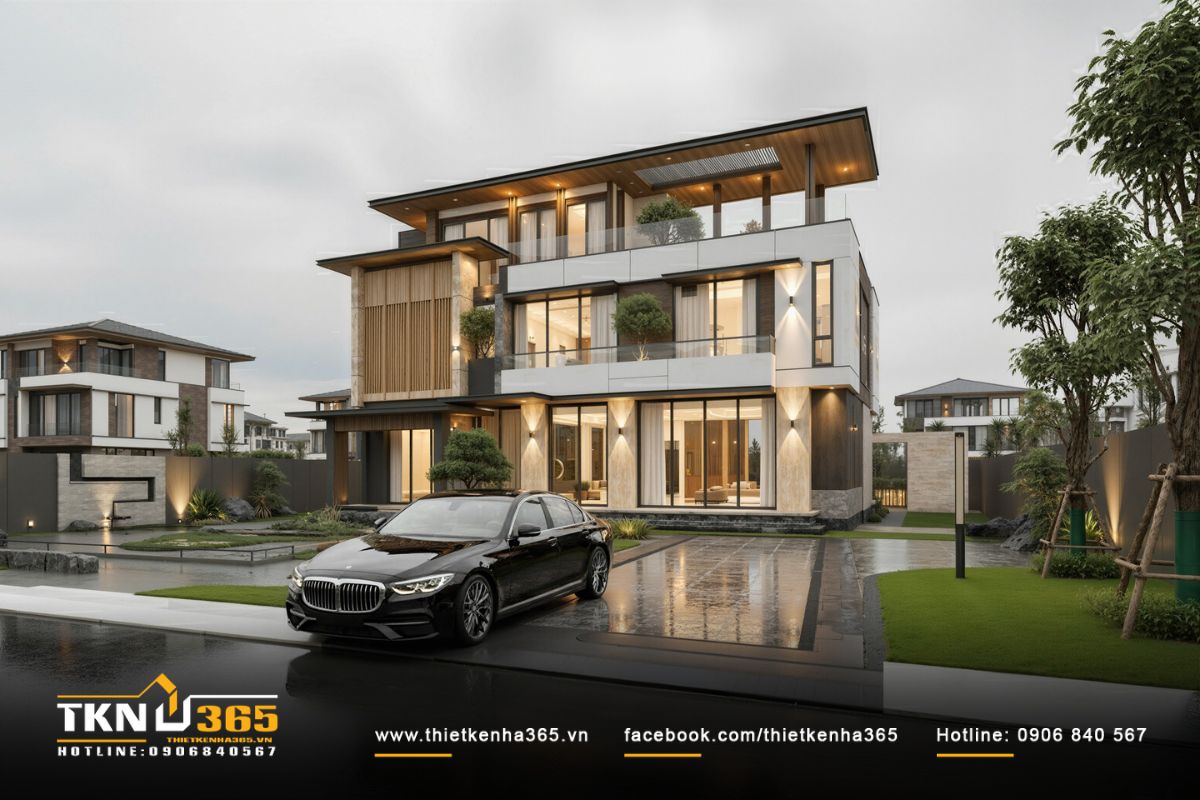 Từ ngoài cổng nhìn vào, các lớp vật liệu đá, gỗ và kính hòa quyện với thiên nhiên, nhấn mạnh tinh thần tối giản nhưng sang trọng