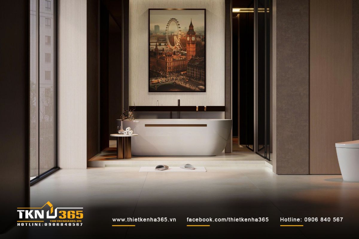 Bồn tắm đặt giữa phòng, điểm xuyết tranh lớn và bàn phụ nhỏ, bình hoa, gợi cảm giác thư giãn nhẹ nhàng