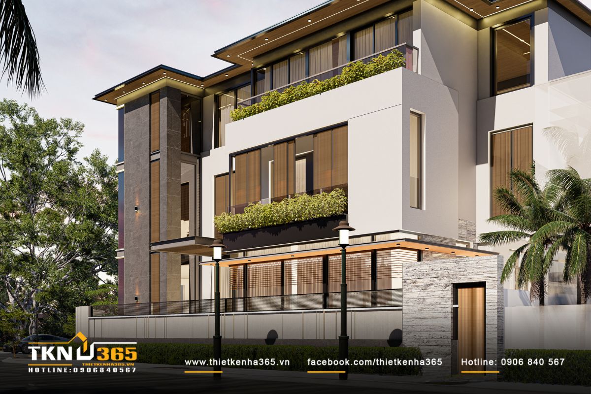 Mặt bên biệt thự thiết kế mạch lạc, hệ ban công trồng cây xanh chạy liên tục dọc theo hai hướng mặt tiền