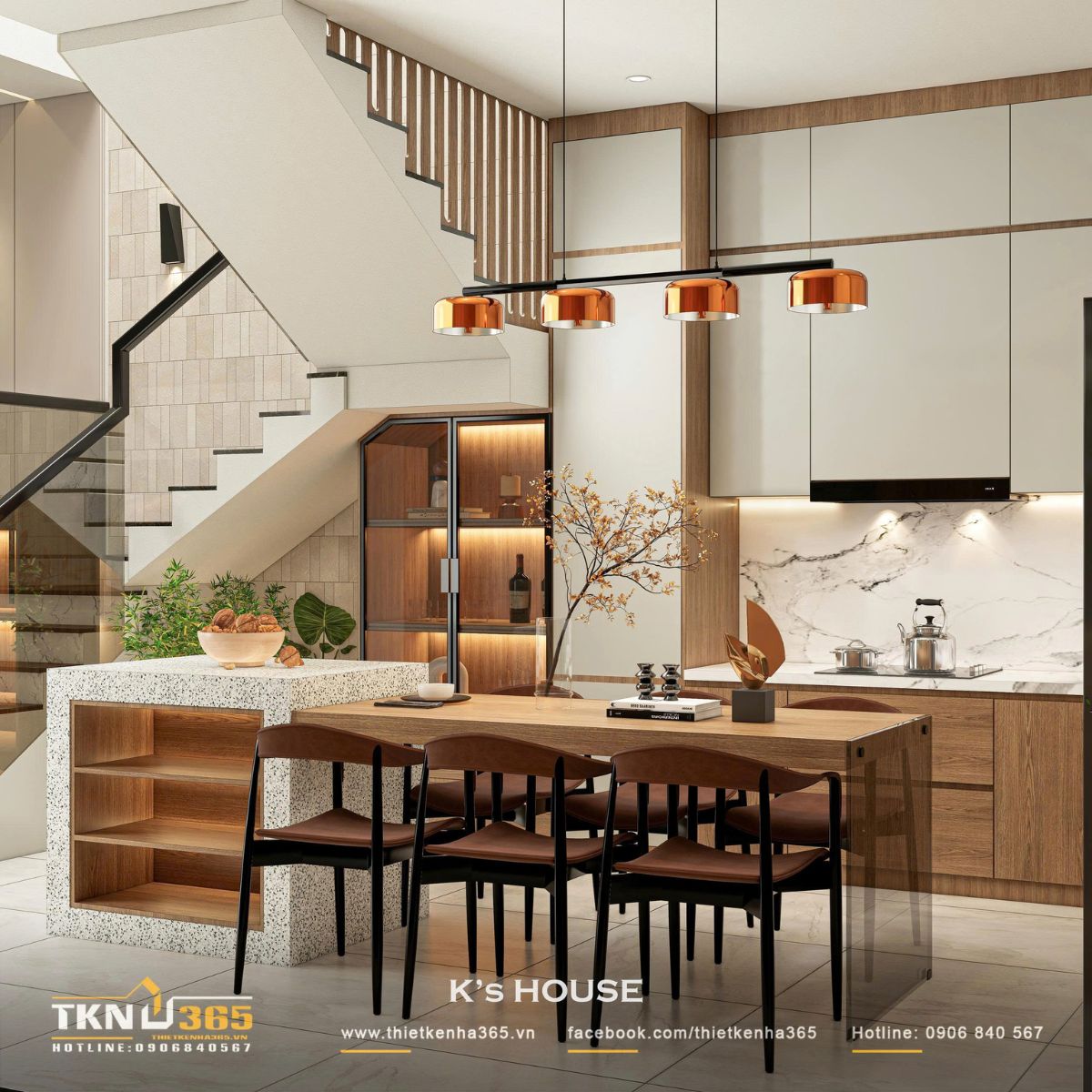 Khu bếp bố trí gọn dưới giếng trời, ánh sáng tự nhiên kết hợp đèn thả ánh đồng giúp không gian luôn sáng và ấm