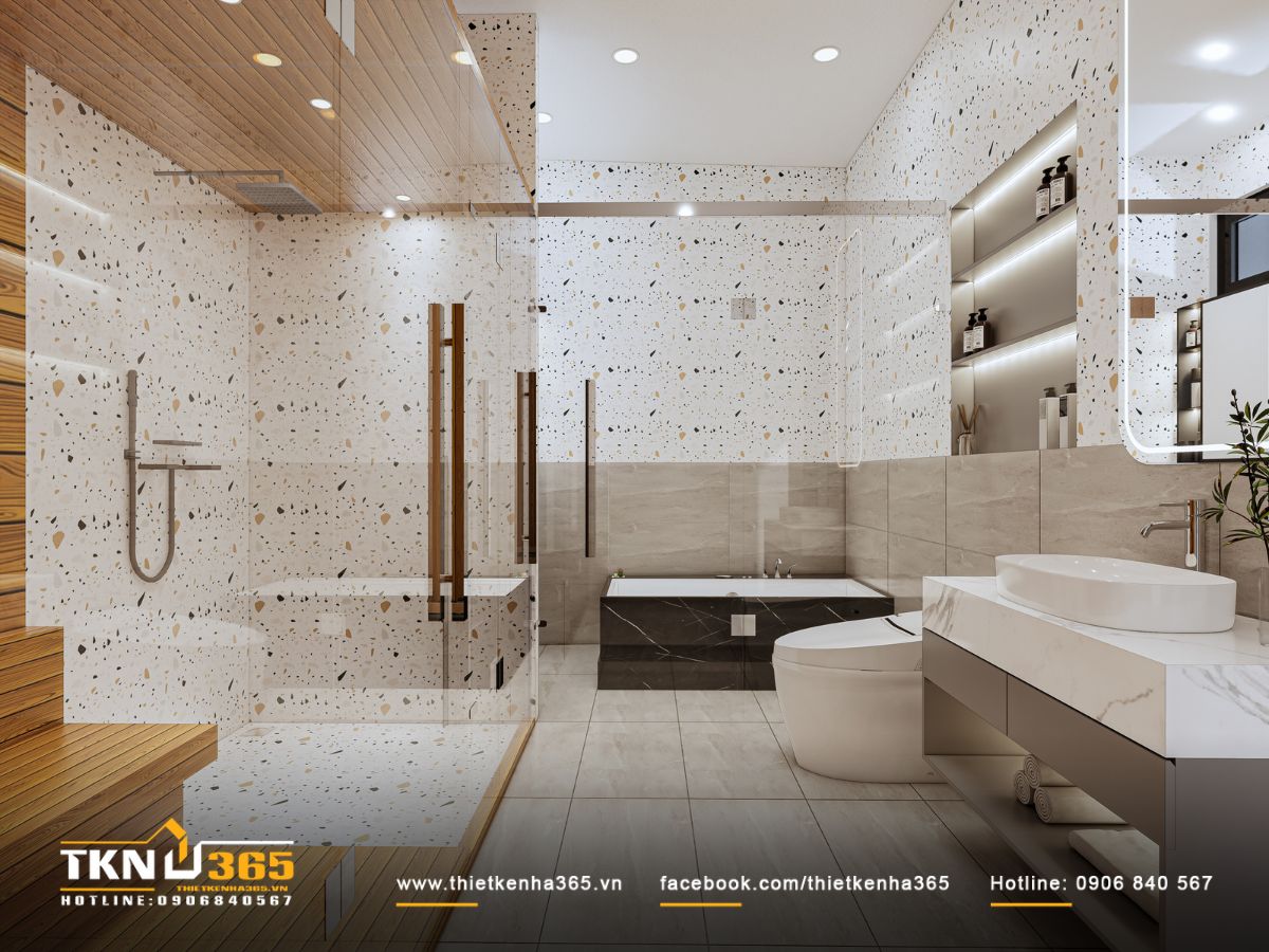 Khu vực tắm - vệ sinh sử dụng đá terrazzo và đá vân mây sang trọng, ánh sáng âm trần tạo bầu không khí thư thái