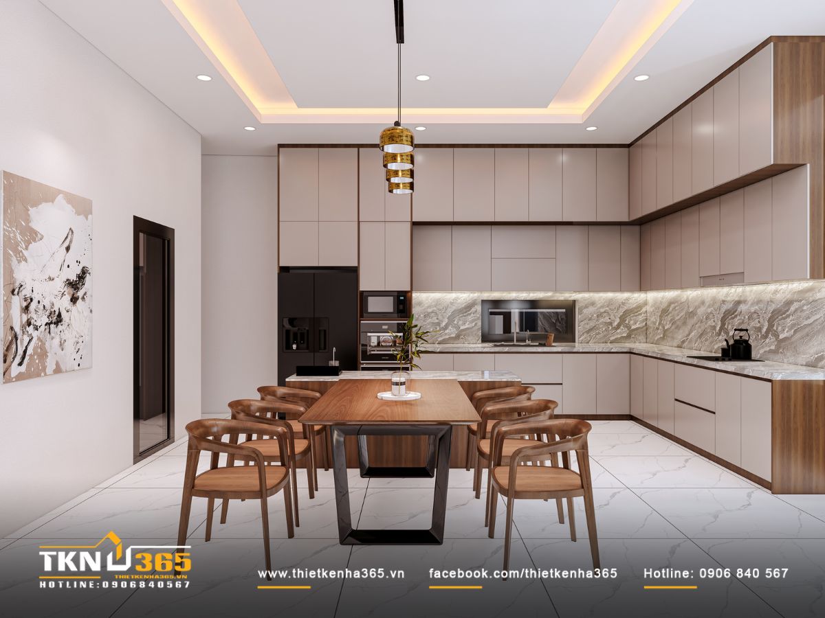 Không gian bếp - ăn ấm cúng với tông màu kem - nâu và mặt đá vân lớn tạo vẻ đẹp sang trọng