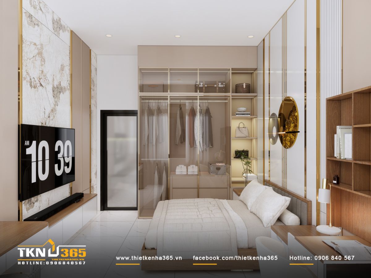 Hệ tủ kính mờ thiết kế kịch trần kết hợp khung vàng mảnh tạo điểm nhấn sang trọng cho phòng ngủ master