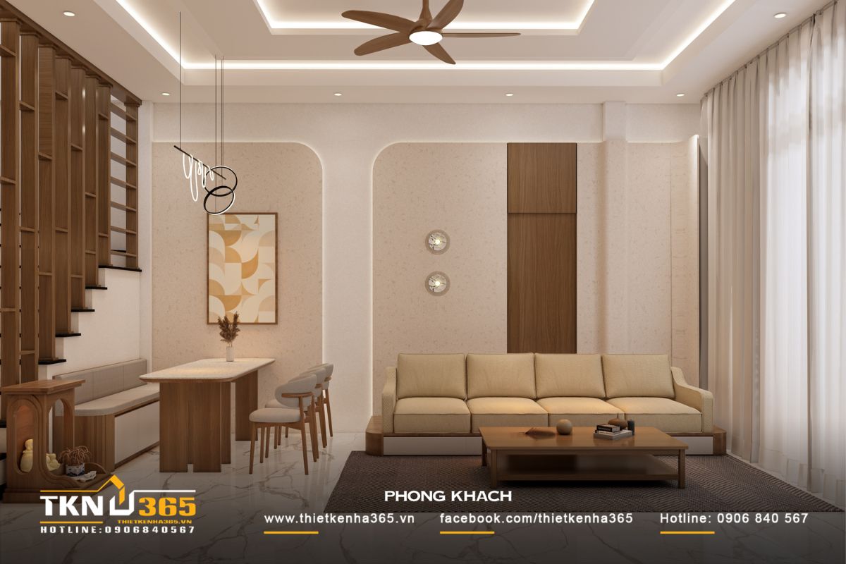 Phòng khách liền bếp theo bố cục mở, sử dụng tông màu be và gỗ sáng tạo cảm giác ấm cúng, nhẹ nhàng