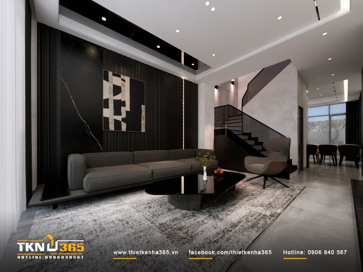 Góc nhìn toàn cảnh phòng khách với bảng màu đen - ghi - trắng vận hành hài hòa, giữ tinh thần tối giản và thoải mái