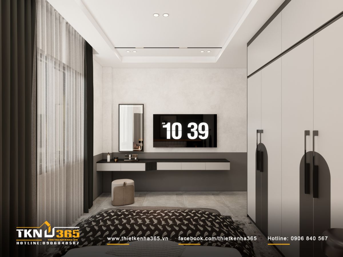 Kệ tivi treo và bàn trang điểm đặt sát nhau, tạo lối đi thoáng từ cửa ra vào đến cửa sổ