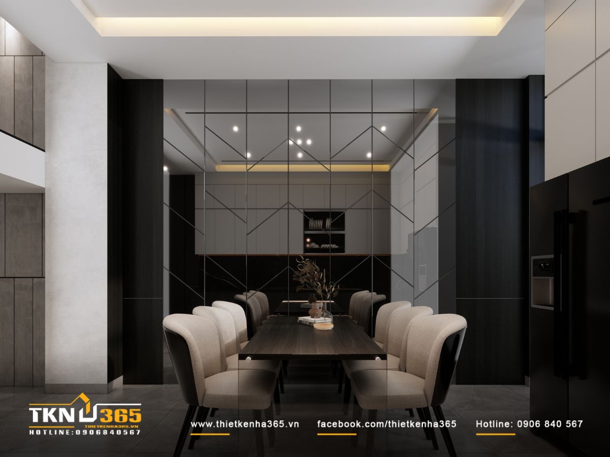 Bức tường bằng gương trang trí bên bàn ăn mở rộng chiều sâu không gian, đồng thời phản chiếu ánh sáng giúp khu bếp luôn thoáng