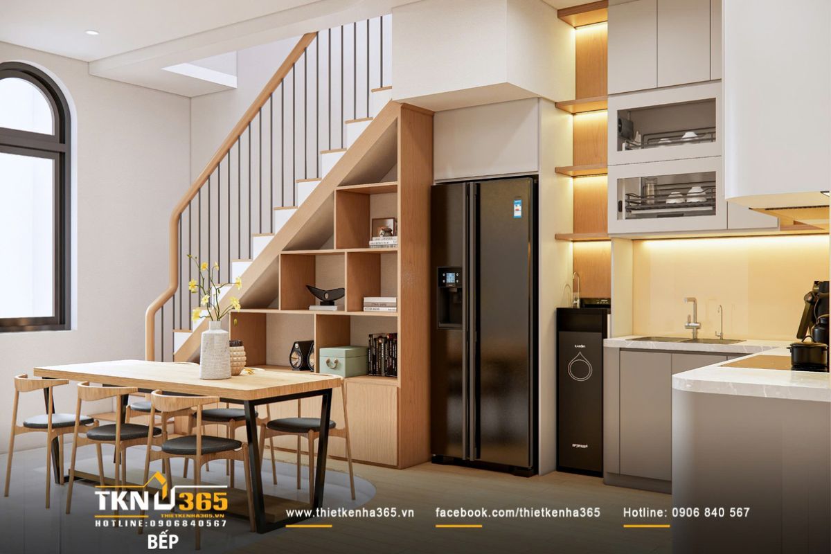 Bàn ăn kết nối tự nhiên với khu bếp và cầu thang, tạo dòng lưu thông mạch lạc