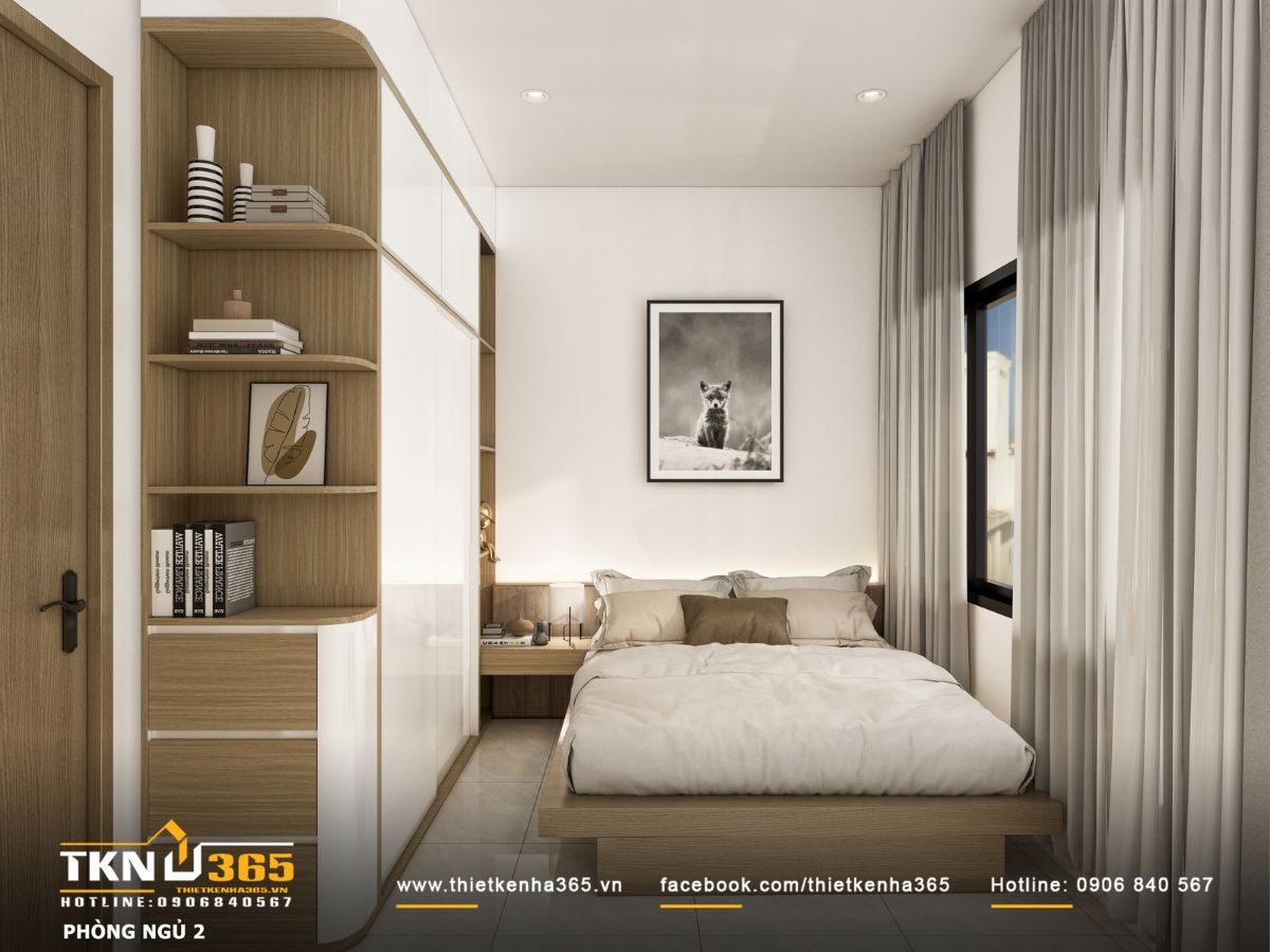 Giường ngủ sáng sủa cạnh cửa sổ lớn, mang lại không gian thoáng và dễ chịu