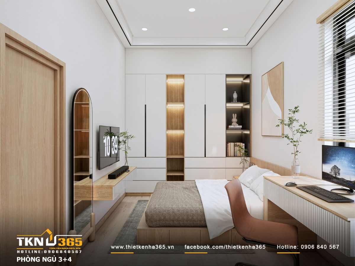 Phòng ngủ thoáng sáng nhờ cửa sổ lớn, trần cao và tường sơn trắng