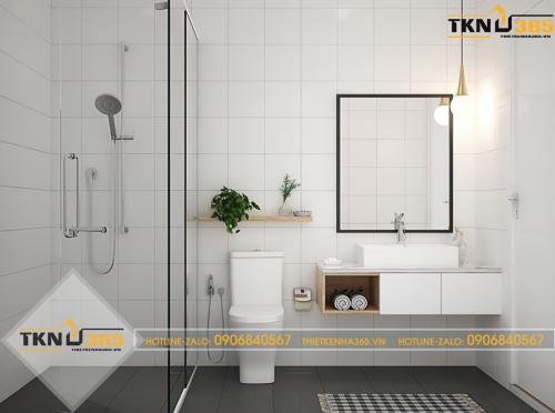 Nhà tắm được ngăn cách với phòng vệ sinh chỉ bằng một tấm kính